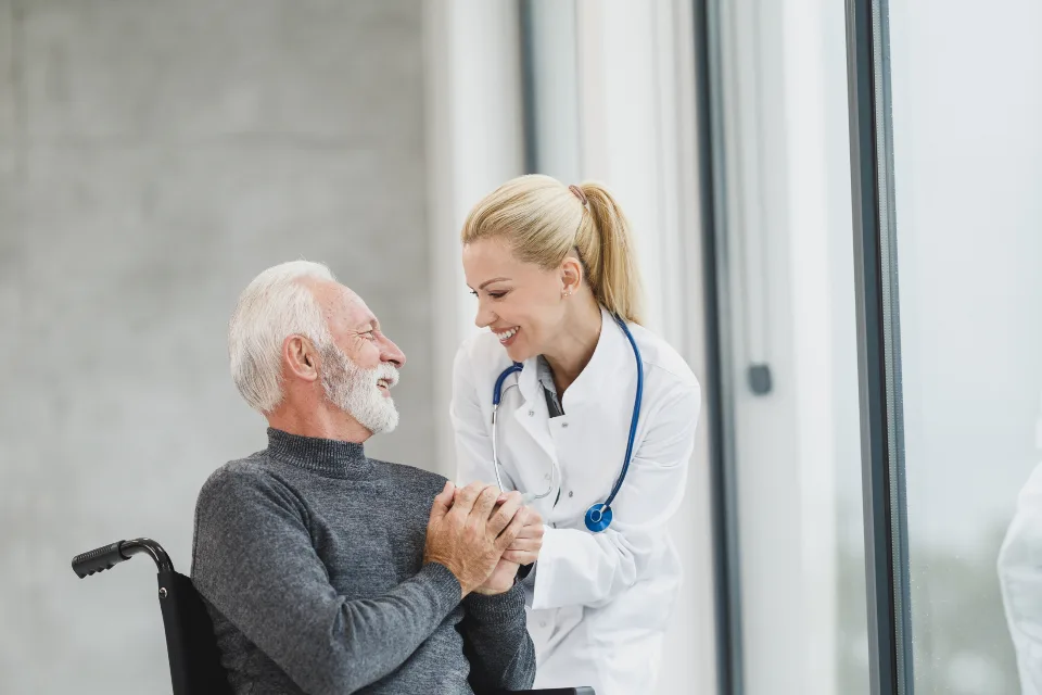 Older man talking with a clinician